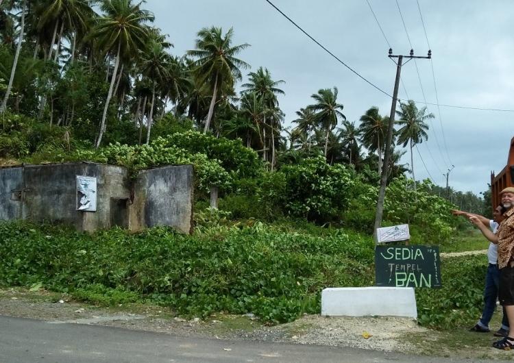 Steve Sutton inspects the remains of a house on Simeulue smashed by the 2004 tsunami