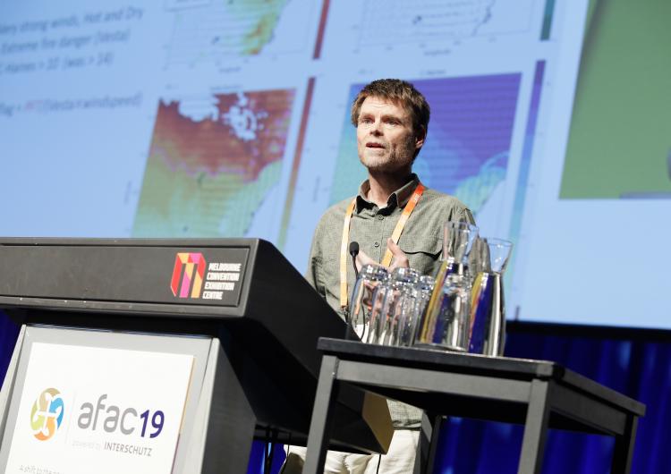 Dr Kevin Tory presenting at AFAC19 powered by INTERSCHUTZ. Photo: BNHCRC. 