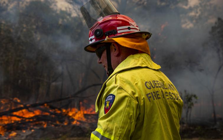 Image of a firefighter during the 2018 Queensland bushfires. Photo: Queensland Fire and Emergency Service.