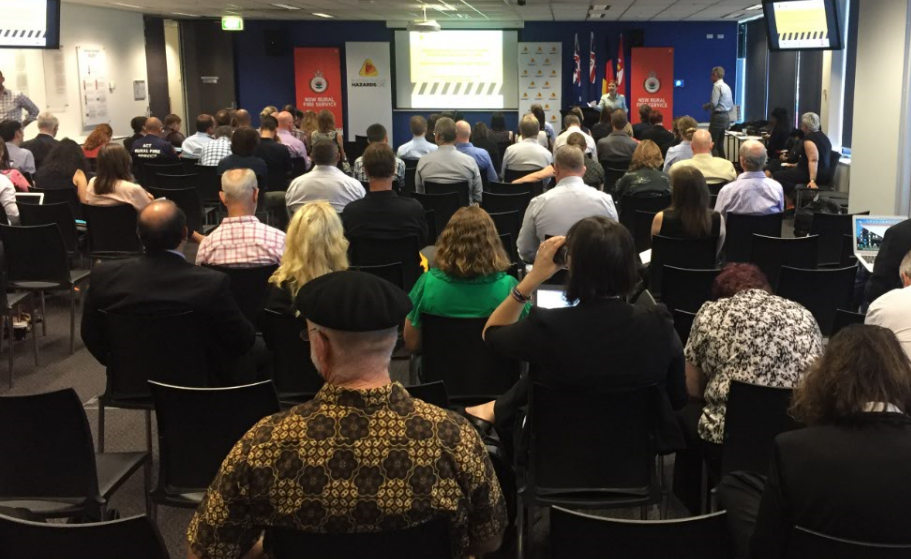 Attendees listening to a presentation at the Sydney RAF.
